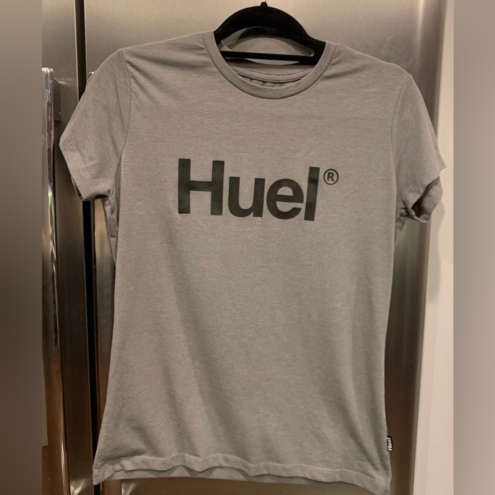 Huel Shirt Top gray with black lettering size medium